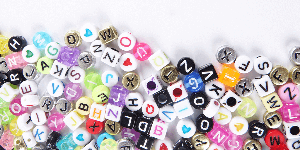 Header image- alphabet beads on white background