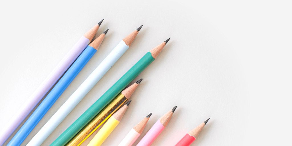 Colored pencils on white background