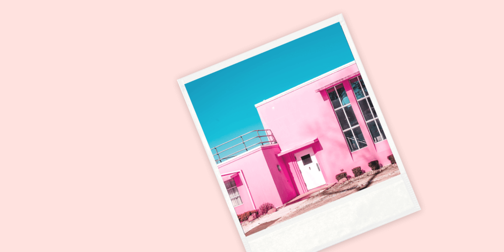 Stock Photo Polaroid of a pink building on a solid background