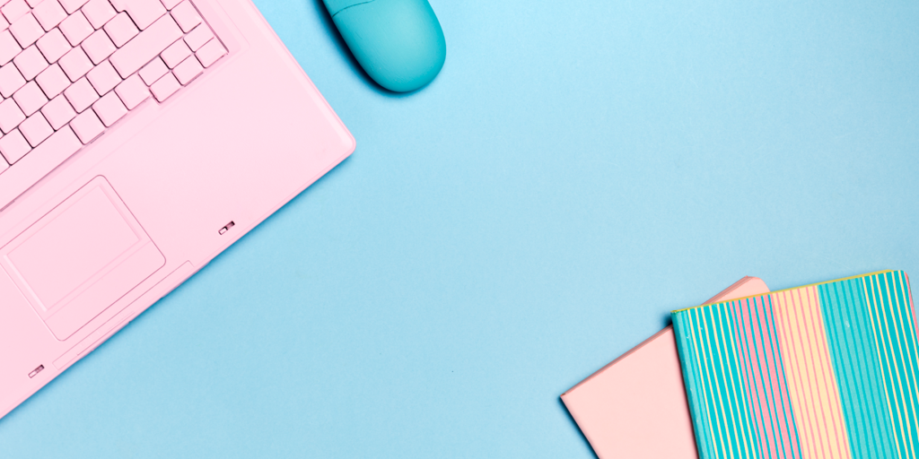 header image- pink laptop and notebooks on blue background