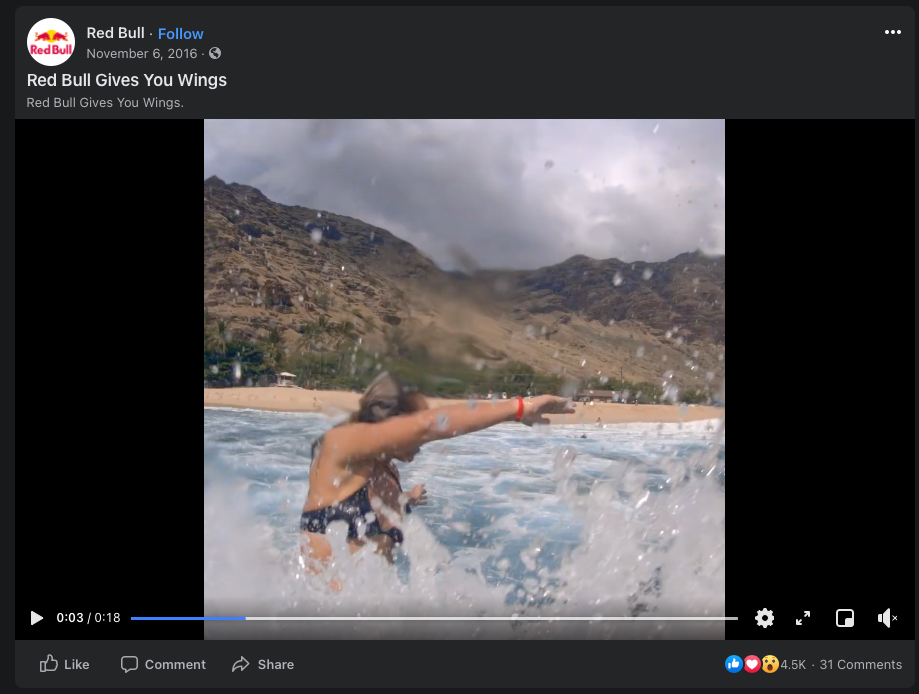 video still of redbull facebook ad featuring an athlete in blue water with red wristband.