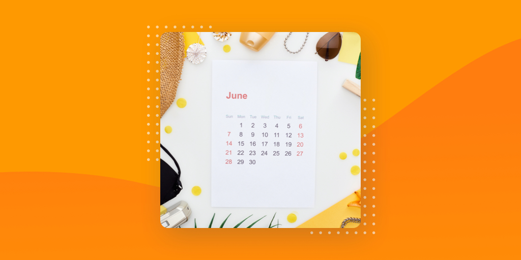 June Calendar surrounded by a straw hat, sunglasses and sunscreen on an orange background